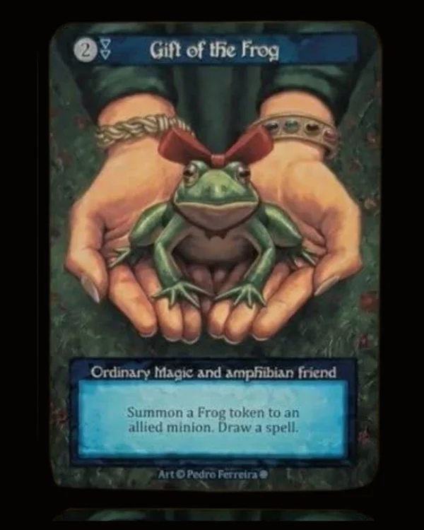 Gift of the Frog Curio — sapo com laço vermelho